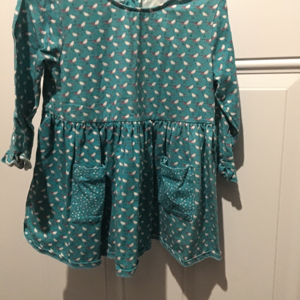 Girls long sleeve top with two pockets size 6